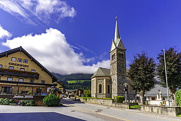 View of church in Niedernsill on a sunny day, Niedernsill, Zell am See district, Salzburger Land, Austria, Europe