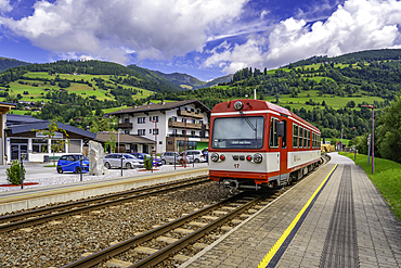 View of local train in Niedernsill on a sunny day, Niedernsill, Zell am See district, Salzburger Land, Austria, Europe