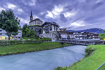 View of church and river in Kaprun at dusk during summer, Kaprun, Zell am See, Salzburg, Austria, Europe