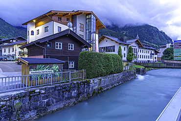 View of town and river in Kaprun at dusk during summer, Kaprun, Zell am See, Salzburg, Austria, Europe