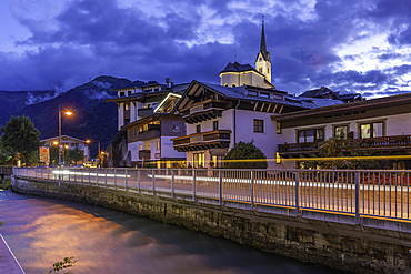 View of church and river in Kaprun at dusk during summer, Kaprun, Zell am See, Salzburg, Austria, Europe
