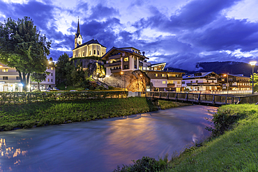 View of church and river in Kaprun at dusk during summer, Kaprun, Zell am See, Salzburg, Austria, Europe