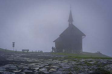 View of Elisabethkapelle chapel in the cloud at Schmittenhöhebahn top station 2000m, Zell am See, Salzburg, Austria, Europe