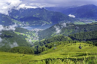 View of Zell am See and cloud from Schmittenhöhebahn top station 2000m on a sunny day, Zell am See, Salzburg, Austria, Europe