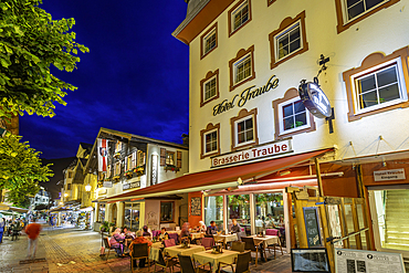 View of restaurant in Zell am See at dusk, Zell am See, Salzburg, Austria, Europe