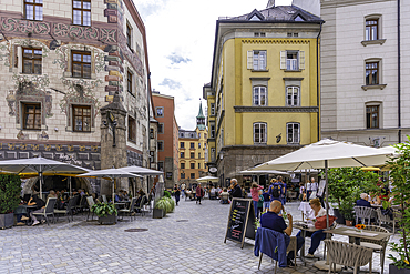 View of cafes in the old town of Innsbruck on a sunny day in summer, Innsbruck, Tyrol Region, Austria, Europe