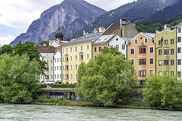 View of colourful buildings and River Inn on a sunny day in summer, Innsbruck, Tyrol Region, Austria, Europe