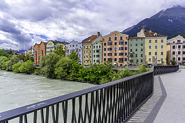 View of colourful buildings and River Inn on a sunny day in summer, Innsbruck, Tyrol Region, Austria, Europe
