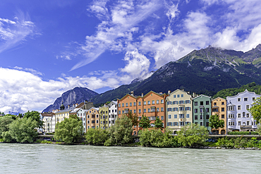 View of colourful buildings and River Inn on a sunny day in summer, Innsbruck, Tyrol Region, Austria, Europe
