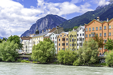 View of colourful buildings and River Inn on a sunny day in summer, Innsbruck, Tyrol Region, Austria, Europe