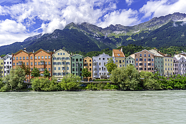 View of colourful buildings and River Inn on a sunny day in summer, Innsbruck, Tyrol Region, Austria, Europe