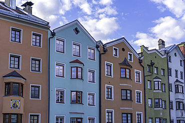 View of colourful buildings and River Inn during golden hour in summer, Innsbruck, Tyrol Region, Austria, Europe