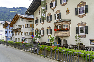 View of colourful building with shuttered windows in the old town, Kitzbuhel, Austrian Tyrol, Austria, Europe