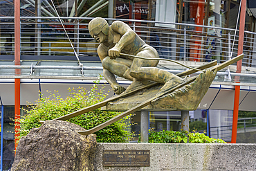 View of bronze skier statue in the old town during summer, Kitzbuhel, Austrian Tyrol, Austria, Europe