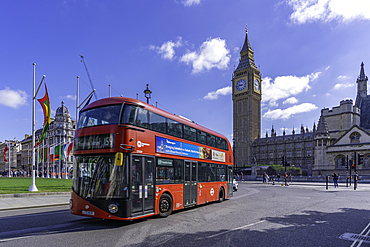 View of Big Ben clock tower and red bus in Parliament Square during summer, Westminster, London, England, United Kingdom, Europe