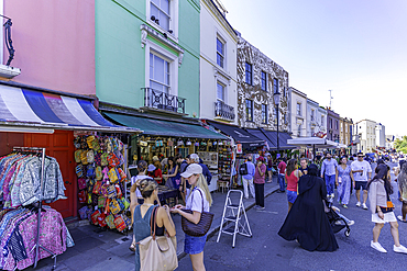 View of colourful shops in Portobello Road during summer, Kensington, London, England, United Kingdom, Europe