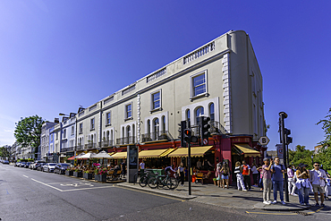 View of colourful shops in Portobello Road during summer, Kensington, London, England, United Kingdom, Europe