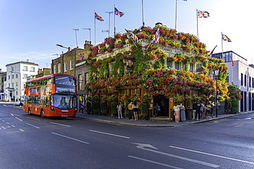 View of the The Churchill Arms, Kensington during summer, Kensington, London, England, United Kingdom, Europe