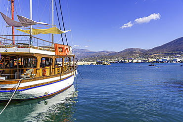 View of boat in Port of Hersonissos, Limenas Chersonisou, Crete, Greek Islands, Greece, Europe