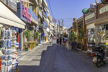 View of shops on main street, Limenas Chersonisou, Crete, Greek Islands, Greece, Europe