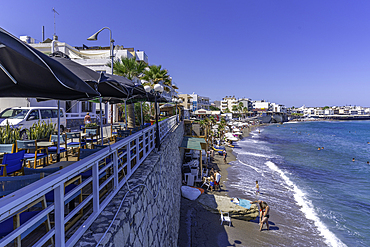 View of taverna overlooking Limena Chersonisou Beach, Limenas Chersonisou, Crete, Greek Islands, Greece, Europe