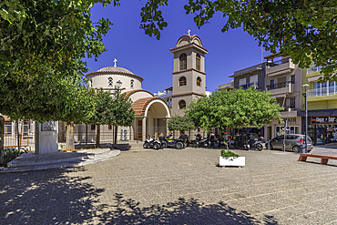 View of church in Church Square, Limenas Chersonisou, Crete, Greek Islands, Greece, Europe
