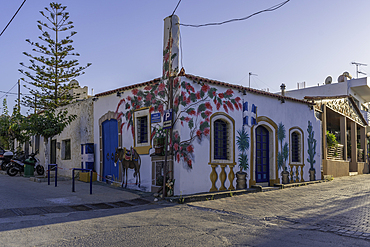 View of colourful painting on building in Chersonisos village, Piskopiano, Crete, Greek Islands, Greece, Europe