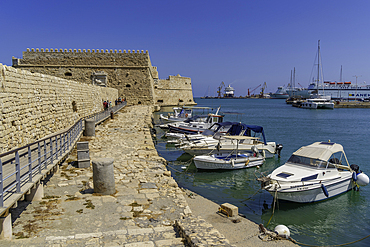View of Koules Venetian Fortress and boats in Heraklion Venetian Port on a sunny day, City of Heraklion, Crete, Greek Islands, Geece, Europe
