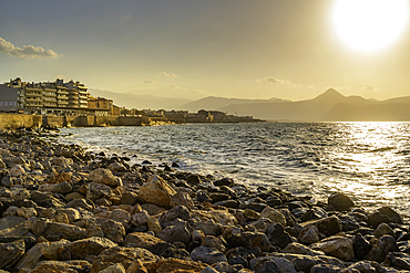 View of coastline at sunset, City of Heraklion, Crete, Greek Islands, Geece, Europe