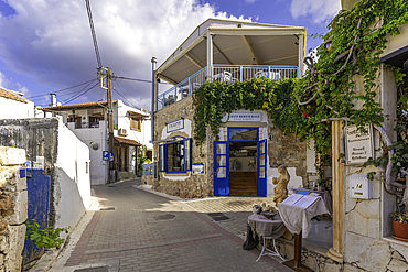 View of taverna's on narrow street in Koutouloufari, Crete, Greek Islands, Greece, Europe