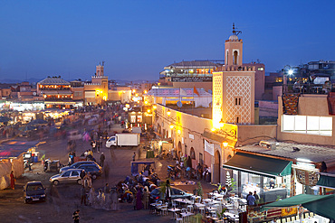 View over market square at dusk, Place Jemaa El Fna, Marrakesh, Morocco, North Africa, Africa