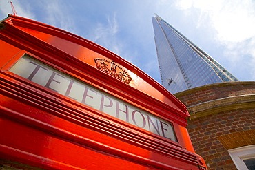 Red telephone box and The Shard, London, England, United Kingdom, Europe