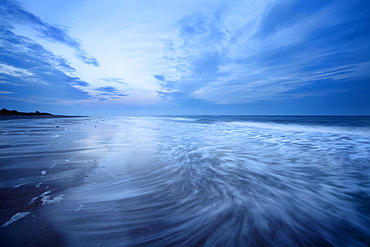 Waves at dusk on Alnmouth Beach, Northumberland, England, United Kingdom, Europe