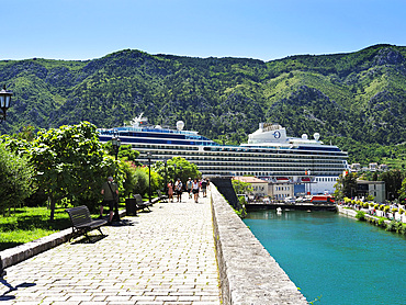 Cruise ship and City Walls, Kotor, UNESCO World Heritage Site, Montenegro, Europe