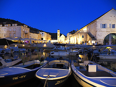 Port of Hvar and St. Stephens Square at dusk, Hvar, Croatia, Europe