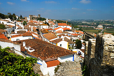 View of old town and castle walls, Obidos, Estremadura, Portugal, Europe