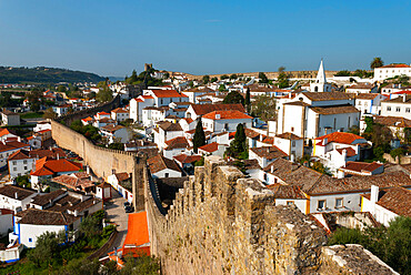 View of old town and castle walls, Obidos, Estremadura, Portugal, Europe