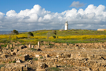 View over ruined Roman town to the lighthouse, The Agora, Archaeological Park, Paphos, UNESCO World Heritage Site, Cyprus, Europe