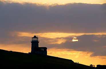 Belle Tout lighthouse on cliffs at sunset, near Birling Gap, East Sussex, England, United Kingdom, Europe