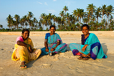 Local women on beach, Benaulim, Goa, India, Asia