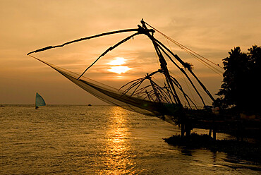 Chinese fishing nets at sunset, Kochi (Cochin), Kerala, India, Asia