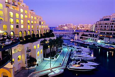 Portomaso Marina at dusk with Hilton Hotel, Paceville, St. Julian`s, Malta, Mediterranean, Europe