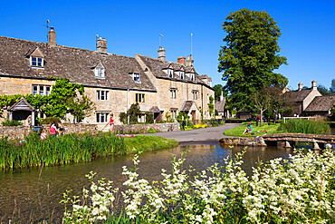 Cotswold cottages on the River Eye, Lower Slaughter, Gloucestershire, Cotswolds, England, United Kingdom, Europe