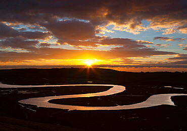 Cuckmere River meanders at sunset, near Seaford, South Downs National Park, East Sussex, England, United Kingdom, Europe