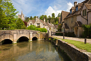 Cotswold cottages on By Brook, Castle Combe, Cotswolds, Wiltshire, England, United Kingdom, Europe