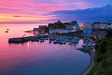 View over harbour and castle at dawn, Tenby, Carmarthen Bay, Pembrokeshire, Wales, United Kingdom, Europe