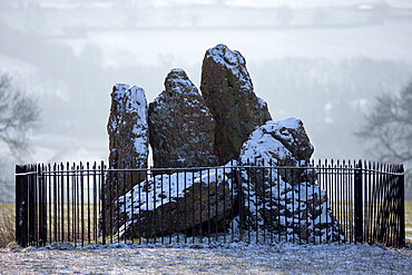 The Whispering Knights in snow, The Rollright Stones, near Chipping Norton, Cotswolds, Oxfordshire, England, United Kingdom, Europe