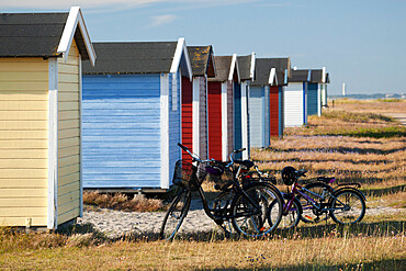 Colourful beach huts and bicycles, Skanor Falsterbo, Falsterbo Peninsula, Skane, South Sweden, Sweden, Scandinavia, Europe