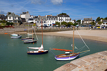 View of beach and boats in harbour, Locquirec, Finistere, Brittany, France, Europe