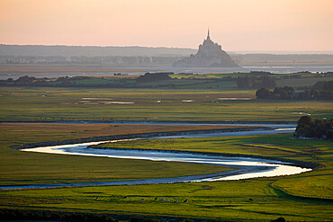 View over meandering river to Bay of Mont Saint-Michel, UNESCO World Heritage Site, from Jardin des Plantes viewpoint, Avranches, Normandy, France, Europe